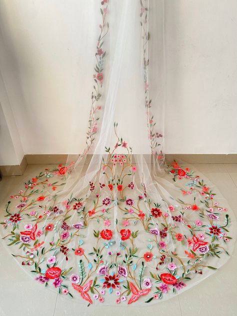 This veil evokes a sense of magic and beauty, emphasizing the vibrant and intricate floral embroidery on your bridal veil. This veil has a width of 108 inches and comes with a separate metallic comb which need to be attached as per your preference. To ensure complete satisfaction with your purchase, we offer you the option to order a sample of our work. The sample is provided on 1 mtr tulle. Bodas Boho Chic, Floral Wedding Veils, Floral Hand Embroidery, Floral Veil, Flower Veil, Wedding Veil Accessories, Dream Wedding Ideas Dresses, Future Wedding Plans, Embroidered Wedding