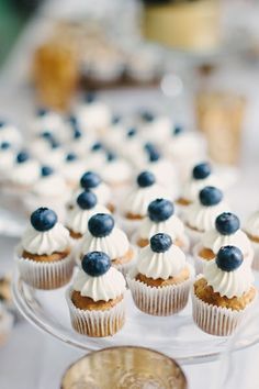 Blue Beauties: Wedding Ideas by Color - www.theperfectpalette.com - The Perfect Palette Goodies Table Ideas, Navy Blue Dessert Table, Blueberry Party Theme, Blue Dessert Ideas, Blueberry Themed Baby Shower Ideas, Dessert Theme Party, Mini Cupcakes Wedding, Mini Cupcakes Ideas, Blue Dessert Table