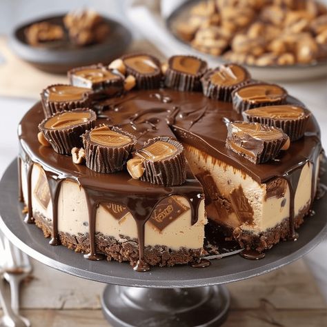 There are desserts, and then there’s cheesecake—a creamy, dreamy confection that’s a dessert unto itself. But when you combine the indulgent flavors of peanut butter and chocolate, particularly with the ... Read more Reese Peanut Butter Cup Cheesecake, Reese’s Peanut Butter Cup Cheesecake Recipes, Reese's Peanut Butter Cheesecake, Reeses Cheesecake, Cup Cheesecake, Peanut Butter Cup Cheesecake, Lemon Blueberry Cheesecake, Bar Desserts, Reese's Peanut Butter Cup