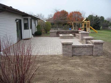 Pony wall around back patio Paver Patio With Water Feature, Square Patio Ideas, Patio And Fire Pit, Fire Pit Materials, Fire Pit Lighting, Patio Design Ideas, Rustic Fire Pits, Patio Pavers Design, Concrete Patios