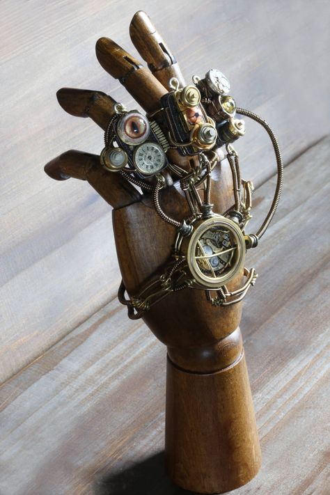 Steampunk mechanical hand by CatherinetteRings on DeviantArt Aesthetic Steampunk, Halloween Nails Design, Moda Steampunk, Steampunk Gadgets, Steampunk Items, Steampunk Aesthetic, Mode Steampunk, Steampunk Couture, Beautiful Halloween