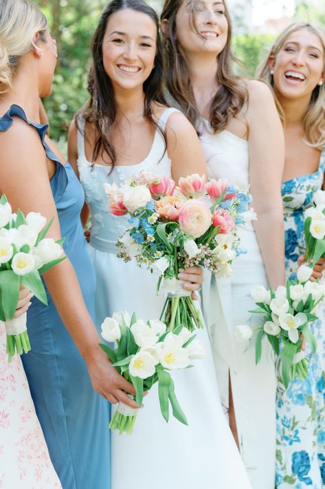 Bride with colorful spring flowers and bridesmaids with all-white tulips. White Spring Bridal Bouquet, White Bridesmaid Bouquet Colorful Bride Bouquet, Spring Bridesmaids Bouquets, Bridal Bouquet With Tulips, White Bouquet With Pop Of Color, Tulip Bridesmaid Bouquet, Garden Party Attire, Marry That Girl, William Aiken House Wedding