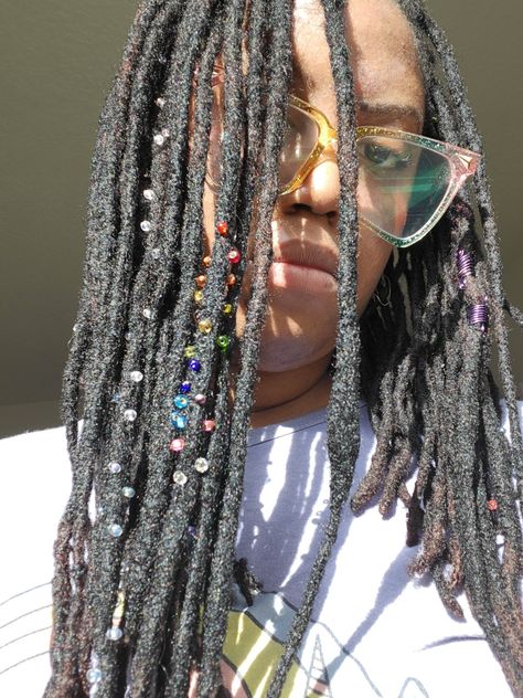 Locs with glass beads in the sun Sprinkle Locs, Loc Sprinkles Locks, Loc Sprinkles, Dreadlocks Jewelry, Prom 2k24, Hair Twists Black, Hair Twists, Loc Inspiration, Curly Braids