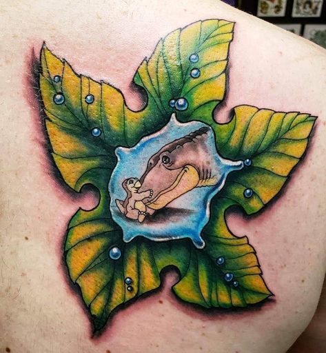 Mother Daughter Dinosaur Tattoos, Nostalgic Tattoos Childhood, Ducky Land Before Time Tattoo, Tree Star Land Before Time, Collar Bone Tattoos For Women Unique, Land Before Time Tattoo, Little Foot Tattoos, Disney Inspired Tattoos, Fandom Tattoos