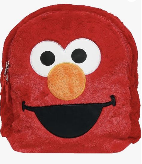 Acrylic Imported Nylon lining Zipper closure Hand Wash Only ELMO PLUSH BACKPACK – With nylon lining inside, this happy Elmo 12 inch mini backpack is made from medium pile plush, making it as soft as your child's favorite stuffed animal. It has vinyl appliqued eye & mouth patches, and a plush applique nose. DESIGNED FOR KIDS - The padded back and padded straps are adjustable for the extra comfort and fit. The bright red color helps kids stand out in a crowd. And best of all, they can cuddle with Toddler Cookies, Elmo Toys, Cookie Monster Plush, Plush Making, Sesame Street Plush, Elmo Plush, Monster Backpack, Elmo And Cookie Monster, Dinosaur Backpack