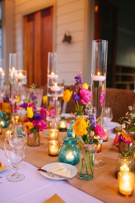 Tablescape of colorful mixtures of vessels and candles-  love this look! Intimate Dinner, Eclectic Wedding, Boda Mexicana, Rainbow Wedding, Bright Wedding, Festa Party, Mexican Wedding, Colorful Wedding, Wildflower Wedding