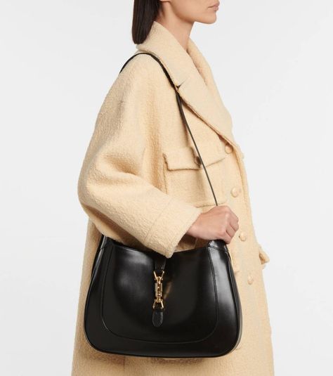 The 6 Best Designer-Bag Investments for 2022 | Who What Wear UK Gucci Jackie Medium, Jackie Gucci Bag, Gucci Jackie Outfit, Gucci Jackie Bag Black, Gucci Black Bag, Mule Outfits, Vintage Bag Outfit, Hobo Bag Outfit, Designer Bags Black