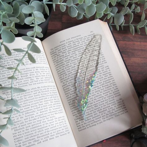 Resin Bookmarks for the book addict 😍 #indigomoon #indigomoonstudiouk #bookmark #resin #feather #bookworm #bookaddict Resin Bookmark Ideas, Emily Tattoo, Bookmark Resin, Resin Bookmarks, Resin Crafting, Feather Bookmark, Bookmark Ideas, Resin Craft, Diy Resin Art