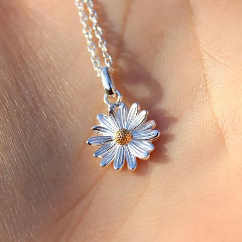 The daisy flower is said to symbolise innocence and purity, whilst also providing cheer and joy. Daisies are the birth flower of April and make the perfect birthday gift  or a treat for yourself this spring time! The daisy pendant measures approximately 11m in diameter. The entire daisy necklace (including chain) is made of high quality 925 sterling silver, with accents of gold plating.  We offer the additional option of personalising the necklace further by adding aninitial pendant. Further det April Birthstone Necklace, Spring Picnic, Gift Logo, Picnic Aesthetic, Daisy Pendant, Daisy Jewelry, April Birthstone Jewelry, April Birthday, White Jewelry Box