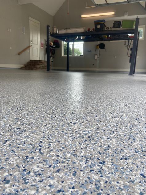 This customer, in Huntersville, NC chose our Stonewash flake blend for their epoxy floor to complement their garage lift and provide a durable, easy to clean surface. For customers that want a touch of blue, but with the flexibility of a predominately gray floor, Stonewash is an excellent flake choice. Epoxy Flake Garage Floor, Garage With Lift, Epoxy Garage Floor, Garage Lift, Gray Floor, Garage Floors, Garage Floor Epoxy, Floor Ideas, Garage Ideas