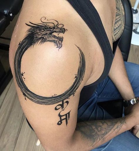 Enso Dragon Tattoo, Shoulder To Arm Tattoo Men, Men Tattoo Ideas Back Shoulder, Tattoo Designs Shoulder Men, Delt Tattoo For Men, Dragon Tattoos For Men Chest, Shoulder Tattoo For Men Meaningful, Guys Shoulder Tattoo, Simple Tattoo Ideas For Men Shoulder