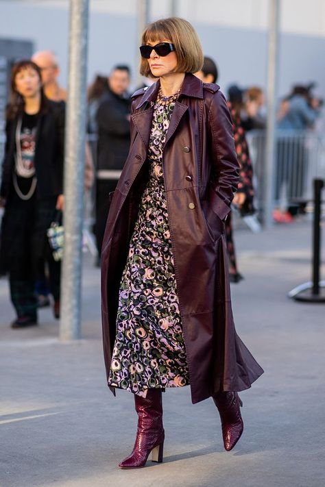 Power uniforms: Anna Wintour in a leather trench, floral dress and matching boots Anna Wintour Winter Outfits, Anna Wintour Style Dresses, Trench With Dress Outfit, Anna Wintour Dress, Winter Floral Outfit, Shirt Dress And Boots Outfit, Winter Floral Dress Outfit, Floral Dress And Boots, How To Style A Floral Dress