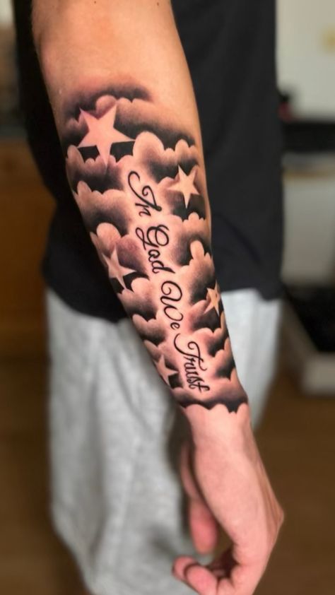 Men’s forearm tattoo with clouds and stars Clouds Tattoo Forearm, Name And Clouds Tattoo, Forearm Tattoo Men Name, Cover Up Shoulder Tattoo Men, Clouds With Stars Tattoo, Make Forearm Tattoo, Basketball Forearm Tattoos, Cloud Stars Tattoo, Now Tattoo Clock