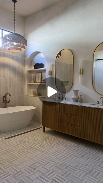 El Peterson on Instagram: "Sharing Part 1 Reveal of my Primary Bathroom! Can you believe this is the same bathroom? Guess where I found the beautiful Vanity, Bathtub, Tile, Alabaster Wall sconces and Hardware from? It's all from @wayfair My go to place for most of my renovation/ home needs. #wayfairpartner. Not going to lie, this bathroom really tested my design skills you guys 🤭😅

***Comment SHOP below to receive a DM with the link to shop this post on my LTK ⬇ https://liketk.it/4PPJD

Head to stories to see a close up! 

OTHER WAYS TO SHOP:
-SHOP MY LTK by clicking link in bio or downloading the @shop.ltk app #ltkfind #ltkhome #ltk #liketkit #wayfair 
 #ltkfindsunder50 #ltkhome #ltkfindsunder100 #bathroominspiration #bathroominspo #bathroomremodel" 3 Vanity Lights Bathroom, Bathroom With Hanging Lights, Kitchen Island Panels, Beautiful Vanity, Vanity Lights Bathroom, Bathtub Tile, Primary Bathroom, Over Toilet, Builder Grade