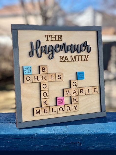 Family Personalized Gifts, Last Name Decor Ideas, Circle Family Name Sign, Basswood Crafts, Scrabble Wall Art Diy Framed, Scrabble Tiles Crafts, Family Decor Ideas, Crafts With Scrabble Tiles, Family Scrabble Wall Art