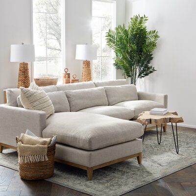 A sectional sofa with comfort and style in one high-end design features a double row of softback cushions and impeccable wood detailing. This modern sectional seats three and fits the various room and design styles. Designed with a solid oak frame, a durable and easy to clean linen blend fabric, and removable and reversible cushions, this living room sectional will last for years to come. | Joss & Main Toronto Chase Sectional Brown 35.0 x 110.0 x 74.0 in | C004866749 | Wayfair Canada Sectional Sofa With Chaise Living Room, Left Chaise Sectional Sofas, Styling A Chaise Sofa, Living Room Sofa With Chaise, Comfy Couch With Chaise, Chase Sectional Living Room, Living Room Designs White Sectional, Cream Couch With Chaise, Sectional Chaise Sofa