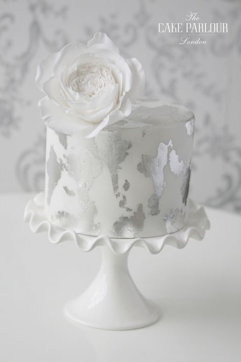 White And Silver Cake Design, White And Silver Cake, White Iced Cake, Most Beautiful Cakes, Leaf Cake, Metallic Cake, Iced Cake, There's No Tomorrow, Wedding Anniversary Cakes