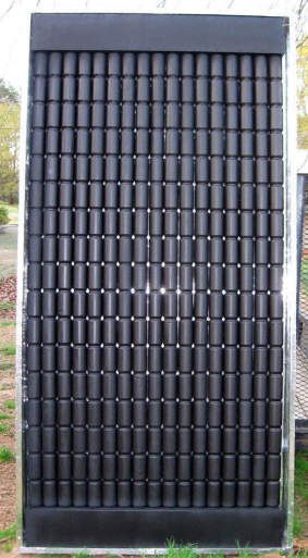 Pop can solar heat collectors.... I built one of these for a science project many decades ago in fifth grade...it was not as nice looking as this one though. Solar Heater, Pop Cans, Solar Projects, Solar Heating, Solar Wind, Diy Solar, Free Energy, Off Grid Living, Green Energy