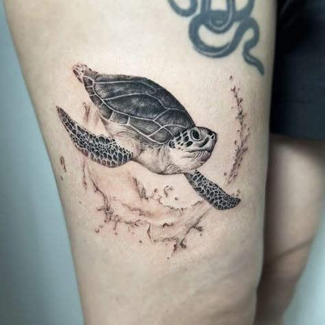 Turtle Power: 30 Sea Turtle Tattoo Ideas for Women & Men in 2024 Sea Turtle Thigh Tattoo, Turtle Thigh Tattoo, Turtle Tattoo Ideas For Women, Sea Turtle Tattoo Ideas, Turtle Tattoo Ideas, Swimming Tattoo, Sea Turtle Tattoo, Ocean Tattoo, Thigh Tattoo Designs