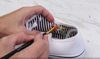 This is a guide on easy rose embroidery. Learn how to embroider shoes by hand in this step-by-step tutorial. Shoe Patches Diy, How To Embroider Shoes By Hand, How To Embroider On Shoes, Embroidery Sneakers Diy, Embroidered Shoes Diy Patterns, Hand Embroidered Shoes, Embroidery On Shoes Diy, How To Embroider Shoes, Embroidery Converse Diy