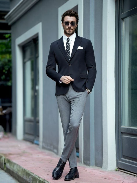 Man wearing a black single-breasted blazer with grey pants, showcasing a sharp and stylish look for formal and smart-casual occasions. Black Blazer With Grey Pants Men, Mens Black Jacket Outfit, Black Blazer Men Outfit, Men Black Blazer Outfit, Slim Fit Body Type Men, Black Blazer Combination, Male Office Outfit, Mens Blazer Outfit Formal, Male Formal Wear