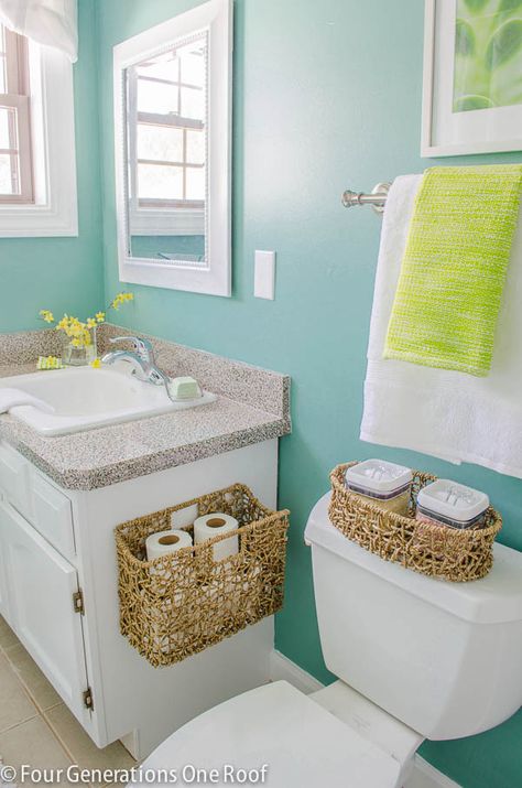 Green Bathroom makeover with simple basket additions from HomeGoods. Love the idea of using a basket to hold toilet paper! Makeover Kamar Mandi, Bad Inspiration, Decor Baie, घर की सजावट, Bathroom Redo, Green Bathroom, Bathroom Renos, Kuta, Kids' Bathroom