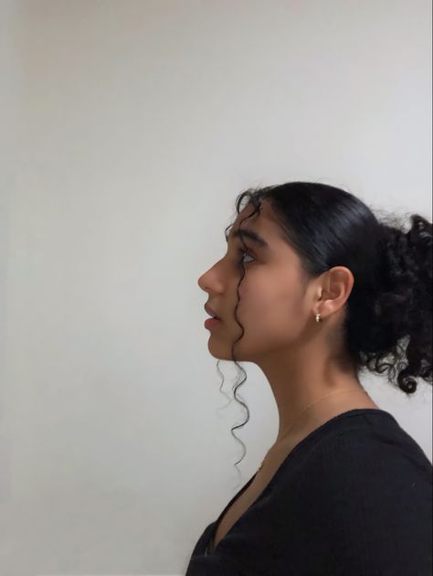 A Latina girl wearing a black slit shirt and styled her curly hair up with two strands out to give it volume . Hooked Nose Side Profile Drawing, Latina Reference Photo, Indian Side Profile, Round Face Side Profile, Latina Side Profile, Side Profile Looking Down, Latina Nose, Person Looking To The Side, Side Profile Looking Up