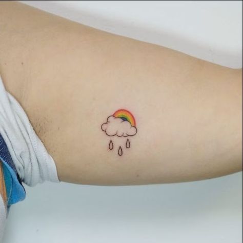 Cute Storm Cloud Tattoo, Rain Tattoo Ideas Minimalist, Cloud With Rainbow Tattoo, Rainbow After Rain Tattoo, Tiny Rain Cloud Tattoo, Rainbow With Clouds Tattoo, Cloud Rainbow Tattoo, Rainbow And Cloud Tattoo, Tattoo Ideas Clouds