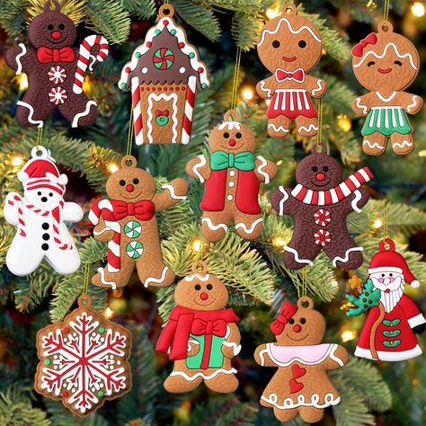 PRICES MAY VARY. 🌲 CHRISTMAS ORNAMENT SET: Contains 12 cute little cookie men, Santa, snowman, snowflakes and candy cookie house, each with a golden string for easy hanging. Choose from a variety of cute and fun patterns to add a Christmas spirit to your home. ☃️ PREMIUM MATERIAL: The Christmas ornament set is made of soft rubber, durable, not easy to break and fade, colorful and unique, very beautiful. Excellent quality and can be used for many years of Christmas decorations. You can't wait to Cookie House, Gingerbread Ornaments, Merry Christmas Decoration, Xmas Tree Decorations, Christmas Ornament Sets, Christmas Party Decorations, Cute Snowman, Christmas Gingerbread, Diy Party Decorations