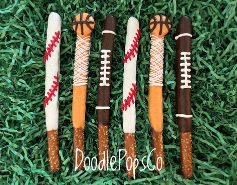 Cute little pretzel rods made just for you!  Includes one dozen sports ball pretzel rods. There are also matching Oreo pops & rice krispy pops available at my shop. They will be individually wrapped with cello bags & tied with matching ribbon. Please give the date that you will need your order. They will be made & shipped closer to your party date. Only place orders that are needed within a 40 day time frame. If you need them sooner than the estimated time frame shown message me & I may be able Baseball Football Basketball Party, Sports Chocolate Covered Pretzels, Baseball Party Snacks Ideas, Sports Theme Desserts, Sports Party Favors For Kids Birthday, Basketball Pretzel Rods, Baseball Chocolate Covered Pretzels, Baseball Pretzel Rods, Baseball Pretzels