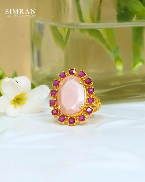 I love how the days transition during this time of year, bringing in a toasty warmth as the season changes, with a slight nip in the air during early mornings and evenings. Celebrating the autumnal colors, this ring showcases a stunning peach moonstone paired with rubies, set off by intricate filigree work on the band—a perfect reflection of the season’s charm. • • • • • • #simranbespokejewelry #simrangosal #saphire #moonstone #rings #gemstonejewelry #thegemexplorer #oneofakindjewelry ... Moonstone Rings, Early Mornings, Peach Moonstone, Changing Seasons, Moon Stone, Moonstone, Gemstone Jewelry, Gems, I Love