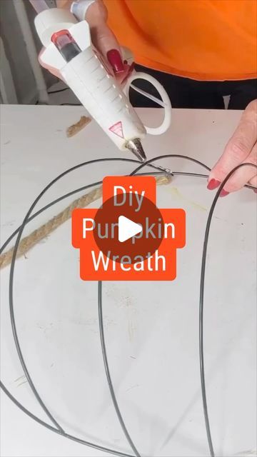 Olivia Parazine on Instagram: "Easy and affordable DIY Dollar Tree pumpkin wreath! Happy crafting! 🍂🎃 #DIYFallDecor #DollarTreeCrafts" Loop Yarn Fall Wreaths, Pumpkin Wreath Diy Mesh Ribbon, Pumpkin Yarn Wreath, Pumpkin Wreaths Diy Dollar Stores, Dollar Tree Wire Pumpkin Wreath, Wired Pumpkin Wreath Diy, Pumpkin Door Wreath, Wire Pumpkins From Dollar Tree, Dollar Tree Stackable Pumpkins Diy