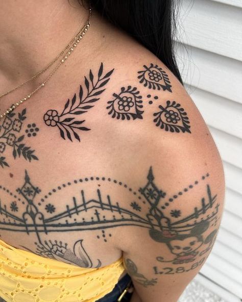 Collar Bone Tattoo American Traditional, Shoulder Cap Tattoo Traditional, Womans Chest Tattoo, Mexican Folk Tattoo, American Traditional Chest Tattoo Women, Traditional Shoulder Cap Tattoo, Traditional Shoulder Tattoos For Women, Charm Tattoo Ideas, Chest Ornamental Tattoo