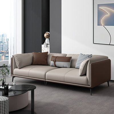 With a simple appearance composed of microfiber leather in coffee and khaki, the rectangle sofa characterizes a large space. A solid wood frame and high-density sponge make it superior soft and comfortable, sturdy and durable. Furthermore, the concise and light luxury design of the sofa is perfect to enhance your room decor, set it in your living room, bedroom, game room or any other area is the best. | Wrought Studio Bezawit Nordic Luxury Simple Loveseat Faux Leather Sofa black/Brown 70.9 x 37. Leather Sofa Drawing Room, Leather Sofa Cream, Cream Leather Sofa Living Room, Cabin Sofa, Cream Leather Sofa, Leather Sofa Living, Grey Leather Sofa, Timeless Sofa, Sofa Design Wood