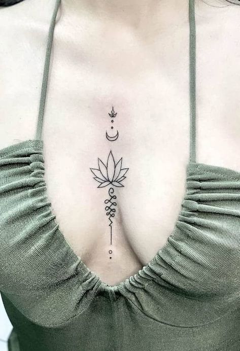 Small Meaningful Tattoos For Women Chest, Lotus Flower Tattoo Under Breast, Lotus Flower Tattoo Between Breast, Middle Breast Tattoos For Women, In Between Chest Tattoo Female Small, Cleavage Tattoos Small, Lotus Chest Tattoo, Lotus Flower Spine Tattoo, Cleavage Tattoos For Women