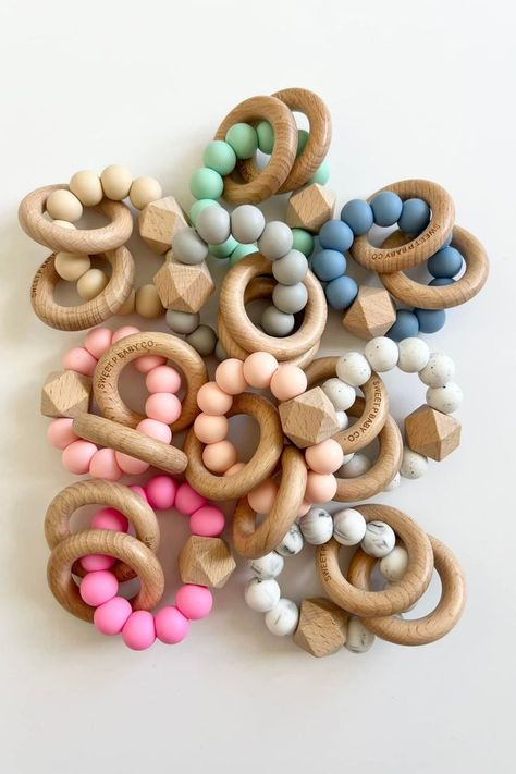 This handmade wooden teethers are made with BPA Free food grade silicone teething beads & natural beech wood. #teethers #woodenteethers #babyteether Diy Teething Toys, Keychain Business, Diy Teethers, Silicone Teething Beads, Wood Teethers, Handmade Baby Items, Wooden Teething Ring, Diy Teething, Teething Beads