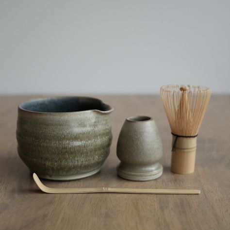 Currently made to order status. 3 to 4 weeks delivery, but if it's in stock it will ship out immediately.  Proudly crafted in Canada with care and craftsmanship. The full Ceremonial Matcha tea set is comprised of a Small Matcha Jar, matcha bowl, one tea cup, handmade whisk holder, high quality bamboo whisk and bamboo matcha spoon. You have the option of adding additional tea cups. Please DM if you would like anything custom added to your order. Matcha Bowl measures roughly 5" wide by 3.5" tall. Matcha Bowl Aesthetic, Matcha Pottery Set, Matcha Set Ceramics, Matcha Whisk Holder, Ceramic Matcha Set, Matcha Pottery, Matcha Bowl Ceramics, Modern Tea House, Matcha Station