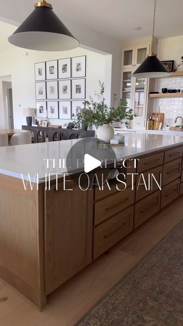 Cindy Nguyen | transitionalmodernhome on Instagram: "IYKYK, it is a struggle looking for the perfect white oak stain.   If you’re looking for a neutral medium toned stain for white oak, this @sherwinwilliams custom stain complements the warm and earthy tones so perfectly. I used it on my kitchen island, ceiling beams in my LR/DR, and primary BR.   ✨SAVE this for reference later if you want to come back and look at it later   ✨Comment STAIN to receive the photo of the formula label in your DMs. You must be following me to see my DM come through!   Tip: ALWAYS test out the stain on a smaller piece of white oak in the room you’re going to be using it in with other finishes.   #interiordesign #customstain #whiteoak #affordablefinds #neutralhome #whiteoakcabinets #remodeling #organicmodern" White Oak And Cream Kitchen Cabinets, White Oak Wood Stain, White Oak Stain Formula, White Oak Island Kitchen, White Oak Stain Colors, White Oak And White Kitchen, White Oak Kitchen Island, White Oak Stain, White Oak Island