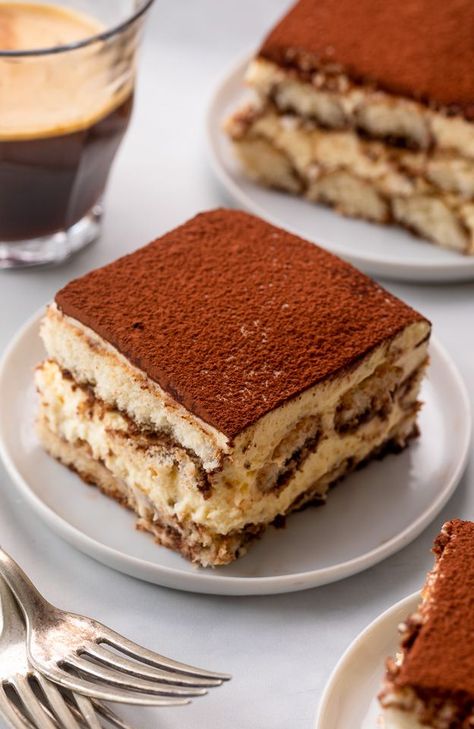 This Classic Italian Tiramisu for a Crowd is always a hit! Made with a creamy mascarpone mixture, coffee soaked ladyfingers, and a dusting of dark cocoa powder, this is heaven in a baking dish! No raw eggs in this recipe! Tiramisu For A Crowd, Homemade Tiramisu Recipe, Italian Tiramisu Recipe, Gastronomische Desserts, Best Tiramisu Recipe, Homemade Tiramisu, Icebox Cakes, Easy Tiramisu Recipe, Italian Tiramisu