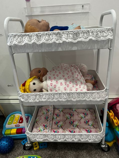 Baby Doll Nursery Playroom Ideas, Doll High Chair Diy, Diy Baby Doll Furniture, Babydoll Storage, Baby Doll Set Up In Playroom, Baby Doll Storage Ideas, Baby Doll Storage, Doll Playroom, Doll Changing Table