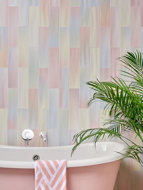 Pink bathtub in front of a wall tiled with pastel tiles. Rainbow inspired theme Latest Bathroom Trends, Pastel Bathroom, Rainbow Tile, Art Deco Style Interior, Ceramic Tile Bathrooms, Ceramic Floor Tiles, Childhood Nostalgia, Bathroom Trends, Pink Bathroom