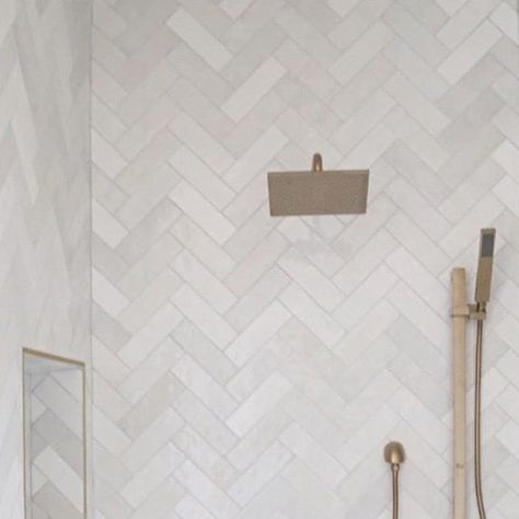 Bedrosians Tile on Instagram: "Loving this chevron installation of our Cloe Collection 2.5x8 in white! Designed by @cbcbuilds" Chevron Marble Tile Bathroom, Cleo Tile, White Herringbone Bathroom, White Herringbone Shower Tile, White Herringbone Shower, Chevron Bathroom Tile, Herringbone Shower Wall, Herringbone White Tile, Herringbone Shower Tile