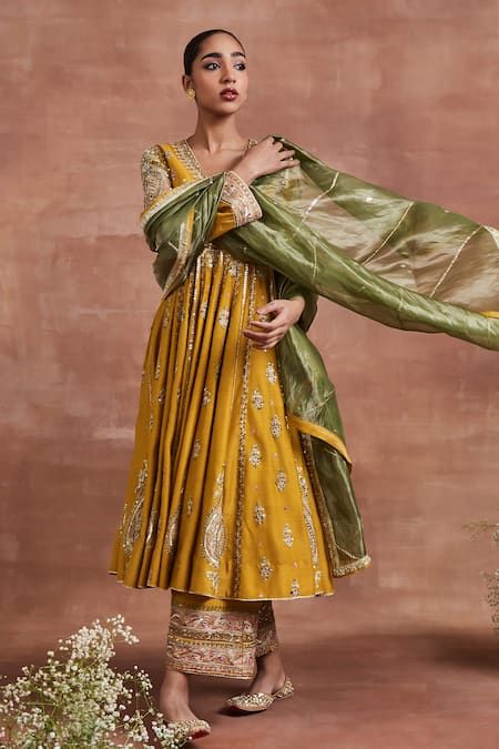 Buy Yellow Moonga Silk And Roop Zari Anarkali Palazzo Set For Women by Sue Mue Online at Aza Fashions. Anarkali Unstitched Suit With Dupatta In Traditional Drape, Anarkali Unstitched Suit With Dabka, Traditional Anarkali Unstitched Suit With Dabka, Gold Anarkali Set In Jamawar, Gold Anarkali Jamawar Set, Gold Jamawar Anarkali Set, Anarkali Unstitched Suit With Zari Work, Anarkali Style Unstitched Suit With Dupatta In Slub Silk, Anarkali Unstitched Suit For Navratri With Dabka