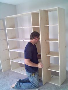 Great idea for how to build a large storage cubby bookshelf. Although it doesn't include step-by-step plans, I think I could figure it out from this picture. Cube Shelves Diy, Cubby Bookshelf, Diy Cubbies, Wardrobes Ideas, Craft Cottage, Cube Shelf, Bookcase Diy, Storage Cubby, Basement Living