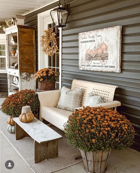 Front porch decorated for fall with rust colored mums, fall sign hung above a vintage metal settee and wood bench. Cozy pillows styled on the settee. Cozy Fall Porch, Kitchen Sink Remodel, Porch Inspiration, Fall Front Porch Ideas, Porch Bench, Fall Front Porch Decor, Floor Remodel, Small Front Porches, Small Porches