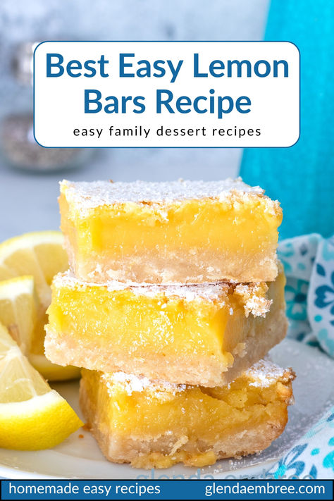 Three lemon bars stacked on a white ceramic plate with lemon wedges on the side. Quick And Easy Lemon Bars, Easy Lemon Recipes Simple, Lemon Bars With Pretzel Crust, Sunny Anderson Lemon Bars, Lemon Bars Using Lemon Curd, How To Make Lemon Bars, Super Easy Lemon Bars, Easy Pan Of Bars, Lemon Refrigerator Bites