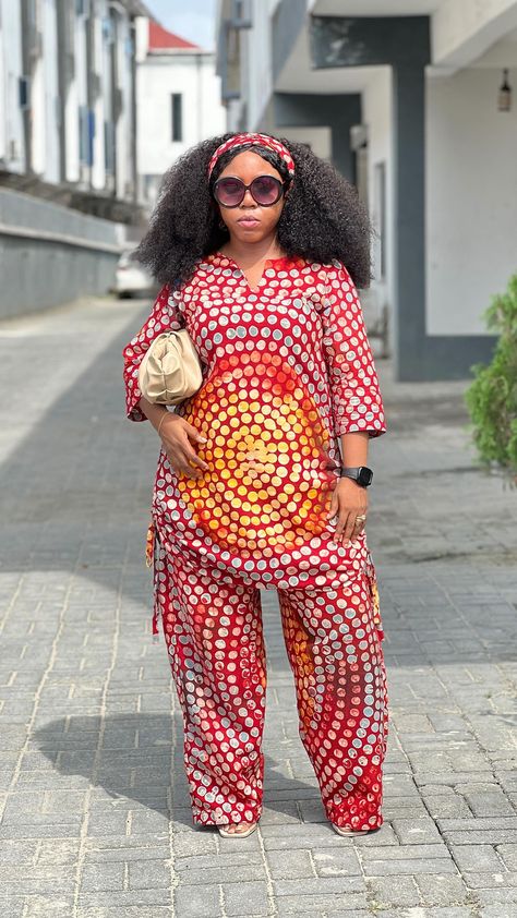 Ankara Womenswear Brand | SOLD OUT IN SAME ADIRE ❌❌❌ ADIRE CREPE SET 😍 Description: a thick crepe adire fabric to make this draw string rope dress top and wide… | Instagram Dress Over Trousers, Trending Two Piece Outfits, Ankara Two Piece, Adire Fabric, Two Piece Outfits Pants, Ankara Trousers, Ankara Outfits, Rope Dress, String Dress