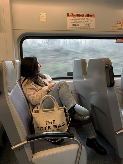 Marc jacobs, the tote bag, train, cold weather outfit, tan jacket The Tote Bag Outfit Marc Jacobs, Marc Jacobs Tote Bag Aesthetic, Marc Jacobs Bag Outfit, The Tote Bag Marc Jacobs Outfit, Mark Jacobs Tote Bag, Marc Jacobs Outfits, Marc Jacobs Leather Tote Bag, The Tote Bag Marc Jacobs, Tote Bags With Zipper