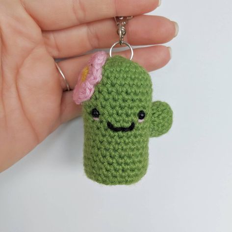 This sweet little cactus is looking for a new home! He is made of wool yarn and polyfill so he can easily be handdwash or machine-washed in cold water and air-dried (you may want to remove the keychain though... unless you like the sound of it; in that case, whatever floats your goat!) Wool Keychain, Cactus Keychain, Wool Design, Crochet Cactus, Small Cactus, Creative Things, Crochet Keychain, Dec 12, Light Holder