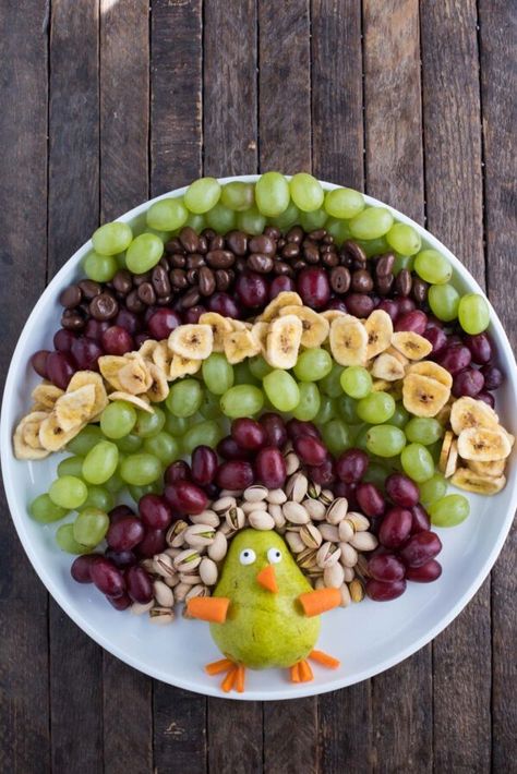 Thanksgiving | The First Year Thanksgiving Fruit Tray, Starbucks Pumpkin Pound Cake, Turkey Fruit Platter, Turkey Fruit, Cheese And Grapes, Thanksgiving Appetizers Healthy, Thanksgiving Fruit, Chocolate Covered Raisins, Thanksgiving Snacks